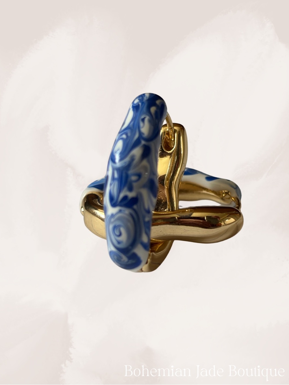 Francesca’s Collections Blue Marble Resin Gold Tone Huggie Hoop Earrings NWT - Picture 4 of 6